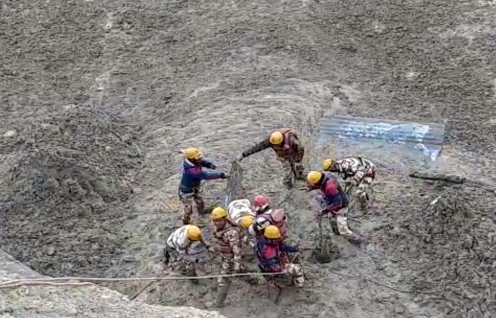 Chamoli: ITBP personnel dig to open Tapovan Tunnel which is completely blocked, after a glacier broke off in Joshimath in Uttarakhand’s Chamoli district causing a massive flood in the Dhauli Ganga river, Sunday, Feb. 7, 2021. More than 150 labourers working at the Rishi Ganga power project may have been directly affected. (PTI Photo)
